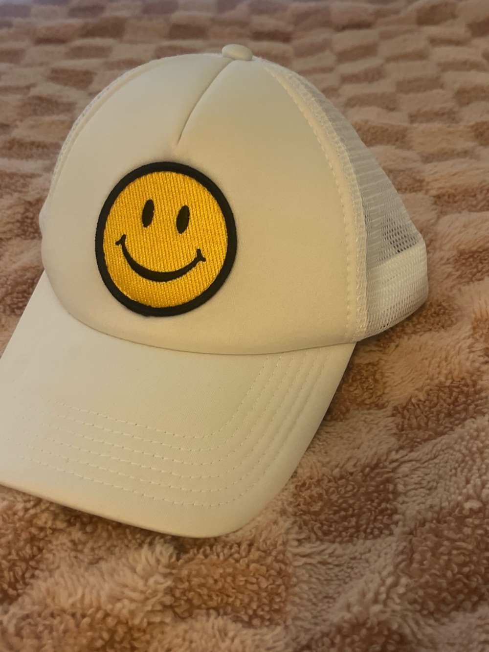 White Trucker Cap with Yellow Smiley Patch